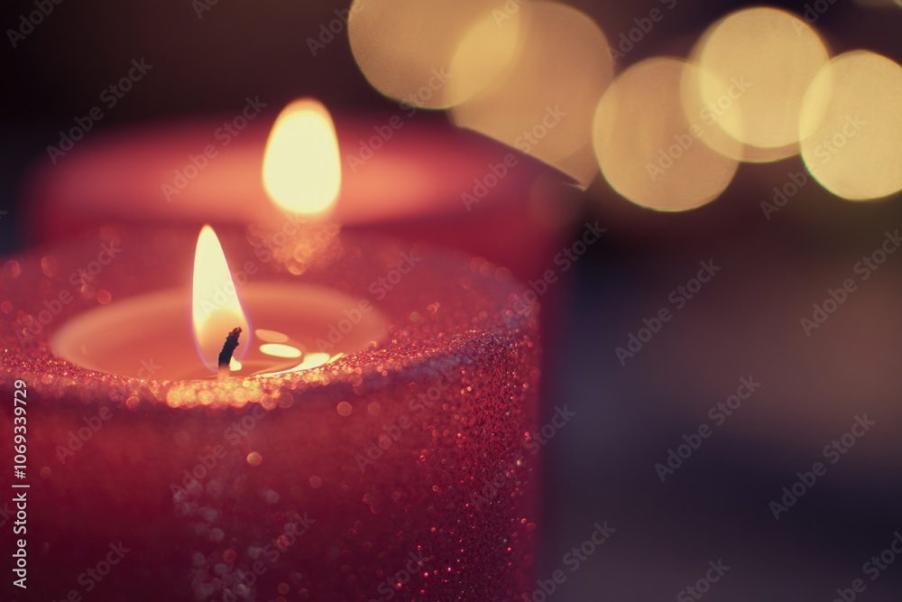 A single red candle on a darkened background, perfect for use as a symbol of remembrance or to add drama to any scene A single red candle on a darkened background, perfect for use as a symbol of remembrance or to add drama to any scene