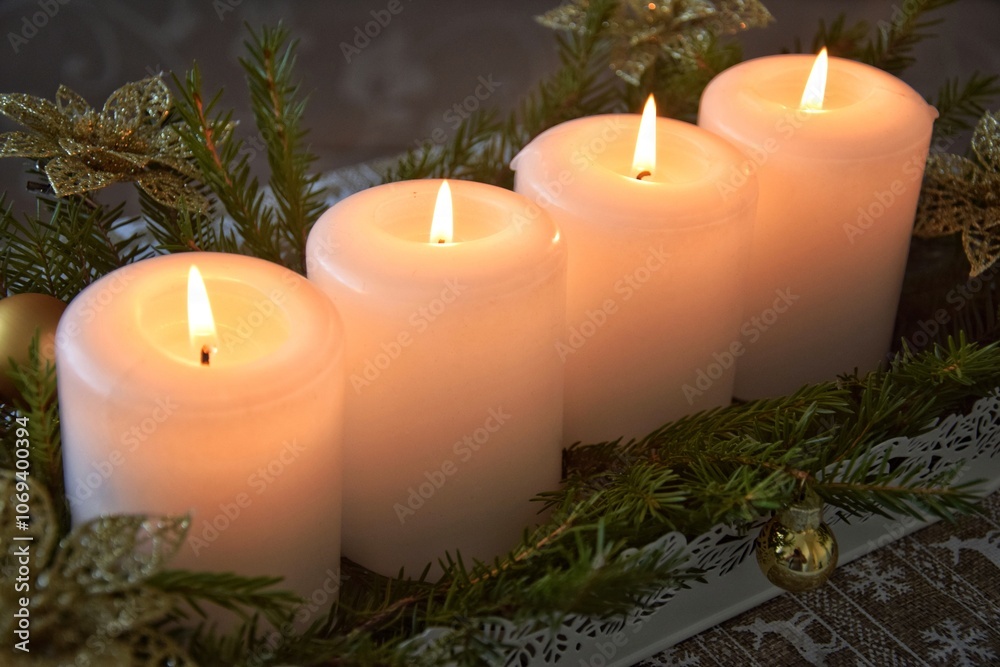 christmas decoration with candle.Four Advent candles are burning. christmas decoration with candle.Four Advent candles are burning.