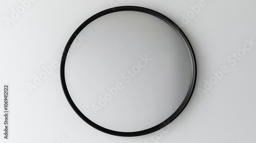 modern interior , round mirror with black frame . hanging on white  wall