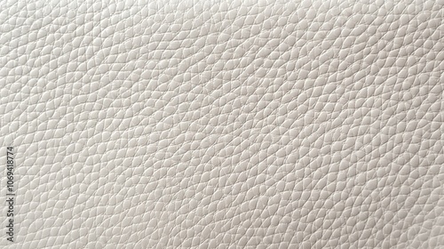 Close-up texture of light gray leather with a pebbled surface.