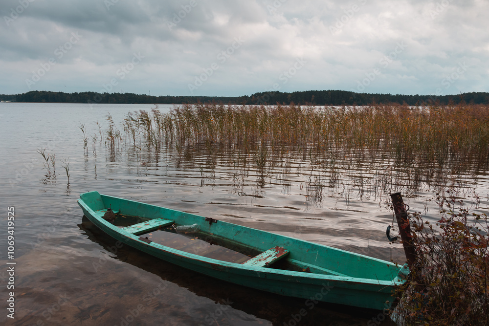 Retro boat in a misty lake. Fog in Shatsky lake, Ukraine. High resolution photo. Retro boat in a misty lake. Fog in Shatsky lake, Ukraine. High resolution photo.