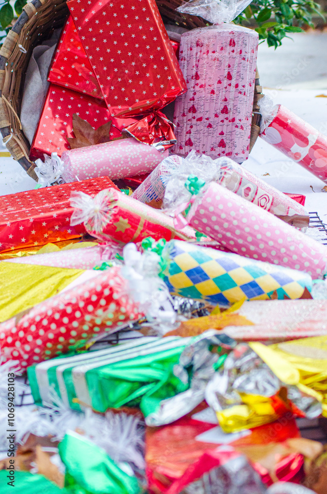 Fototapeta premium gift packages as christmas decorations in the streets of a city, christmas background concept