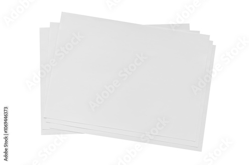 A stack of blank sheets of paper ready for various art and writing projects in a minimalist workspace environment. Isolated