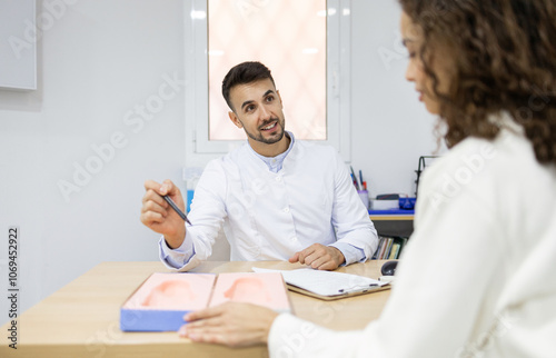 Consultation and Product Discussion in Orthopedic Store photo