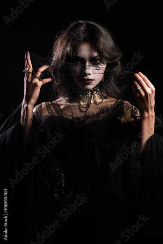 Mysterious Gothic Woman with Dark Makeup and Veil