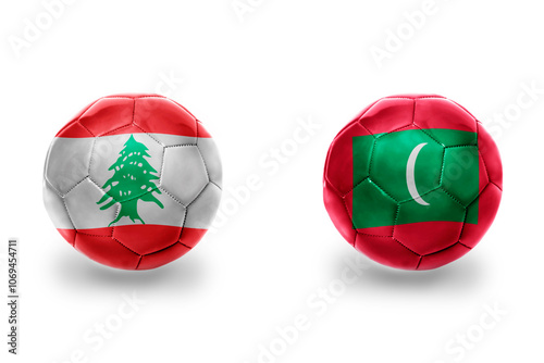 football balls with national flags of maldives and lebanon ,soccer teams. on the white background. photo