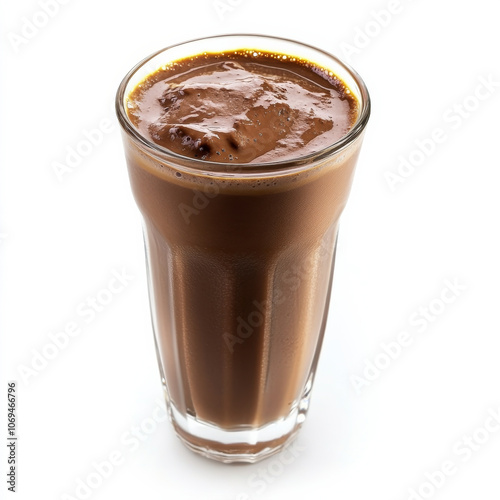 A glass of rich chocolate milkshake, isolated on a white background, highlighting a decadent drink