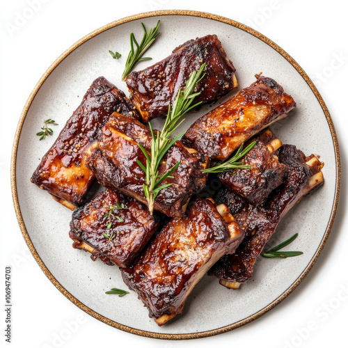 A plate of juicy BBQ ribs, isolated on a white background, emphasizing a classic grill dish photo