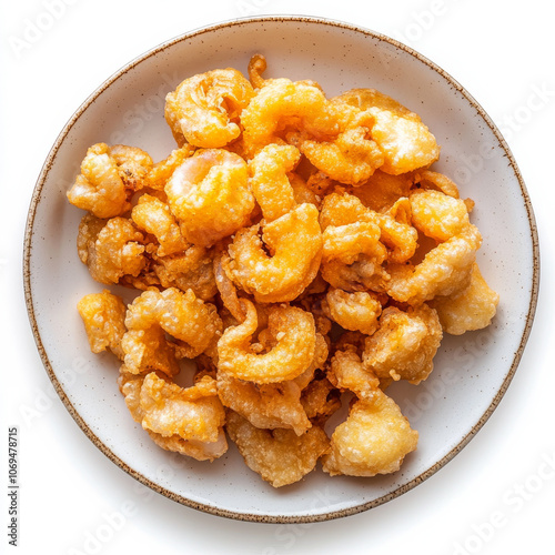 A plate of fried calamari, isolated on a white background, highlighting a crispy seafood snack