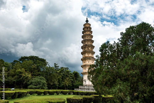 Ancient Pagoda Tower Surrounded by Lush Greenery