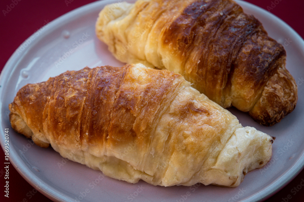 croissant on a wooden table croissant on a wooden table