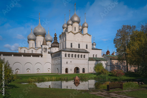 Church of the Resurrection, the gate to Cathedral Square, the domes of the Assumption Cathedral from the pond in the Vladychy Dvor of the Rostov Kremlin, Rostov Veliky, Yaroslavl region, Russia photo