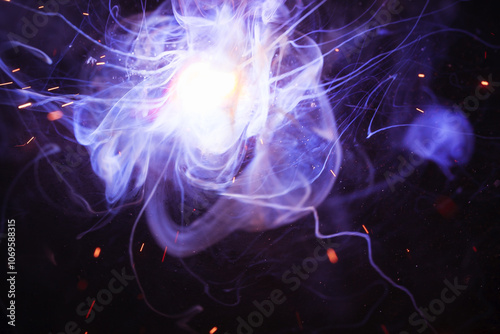 A bright flash of light and a sheaf of sparks in a cloud of smoke. Miniature Universe. Design elements for invitation, wedding cards, greeting cards, Silvester day, christmas decoration.