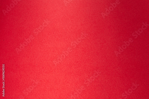 A red background with white dot in the middle, textured origami paper backdrop