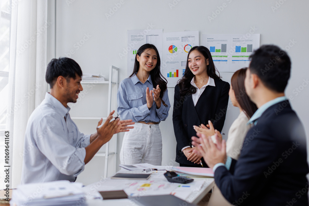 Asian business people working together in the office, Young asian people at business meeting.
Asian business people working together in the office, Young asian people at business meeting.