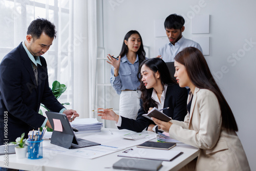 Asian business people working together in the office, Young asian people at business meeting. 