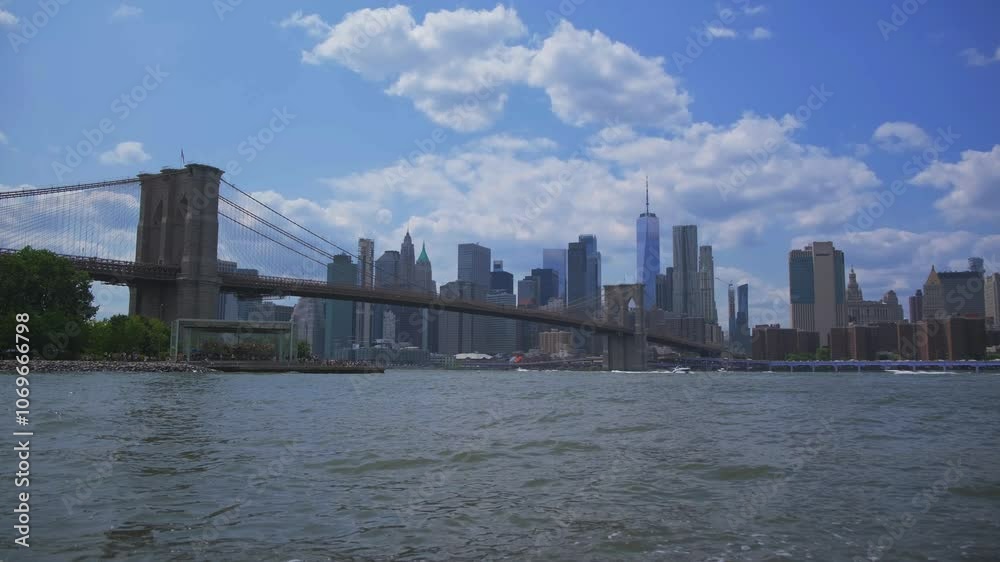 Brooklyn Bridge and Manhattan bridge at midday against blue sky. Brooklyn Bridge and Manhattan bridge at midday against blue sky.