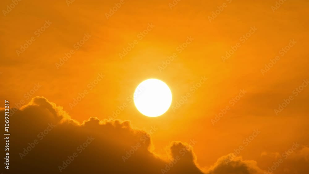 Time lapse of dramatic sunrise with orange sky in a cloudy day. Time lapse of dramatic sunrise with orange sky in a cloudy day.