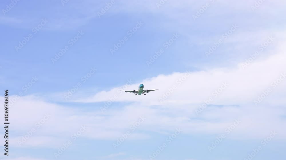 Plane Executing a Landing Maneuver for a Smooth Touchdown on the Runway. Airplane Changing Position While Approaching the Airport for a Smooth Landing on the Runway Under Clear Skies Plane Executing a Landing Maneuver for a Smooth Touchdown on the Runway. Airplane Changing Position While Approaching the Airport for a Smooth Landing on the Runway Under Clear Skies