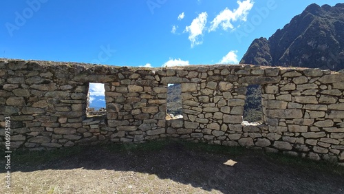 Three windows in the stone wall of an ancient house at Sayacmarca, lost Inca miliary fortress located along the Inca Trail to Machu Picchu. It was never discovered due to its hidden location. photo