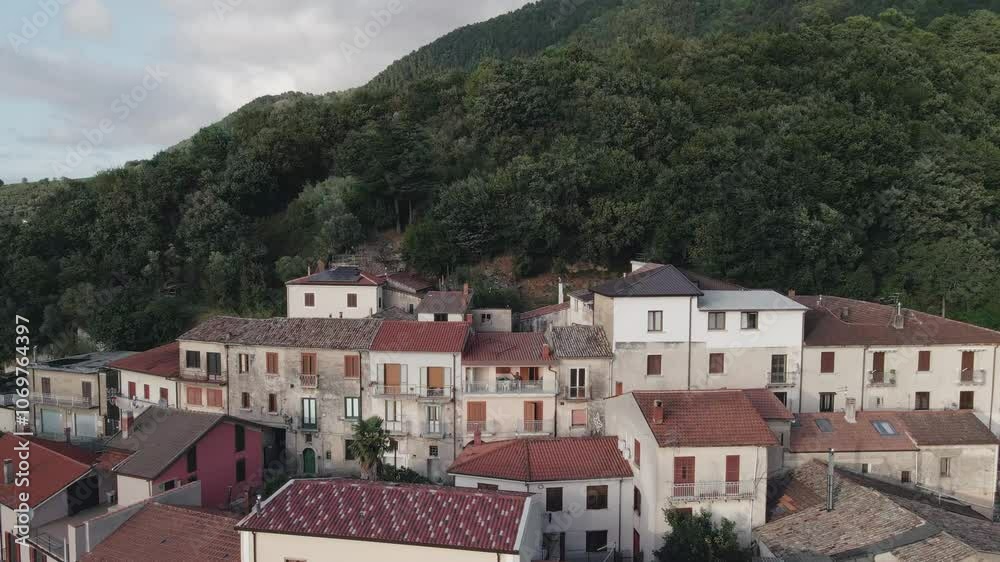 A drone lifting up over the town of Santo Stefano del Sole in Campania, Italy. A drone lifting up over the town of Santo Stefano del Sole in Campania, Italy.