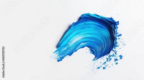 Vibrant blue acrylic brush stroke isolated on a pure white background photo