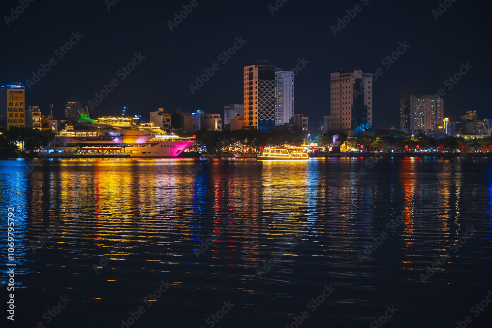 Night panorama of the Han River embankment and skyscrapers in the center of Da Nang in Vietnam at night Night panorama of the Han River embankment and skyscrapers in the center of Da Nang in Vietnam at night
