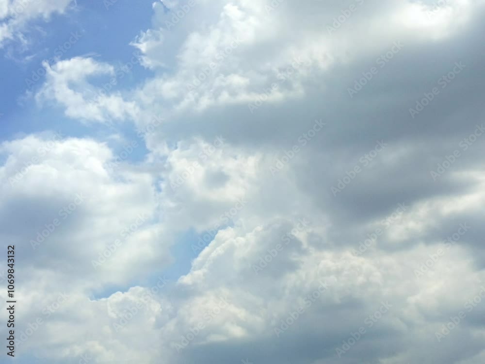 animated video of blue sky and white clouds during the day animated video of blue sky and white clouds during the day