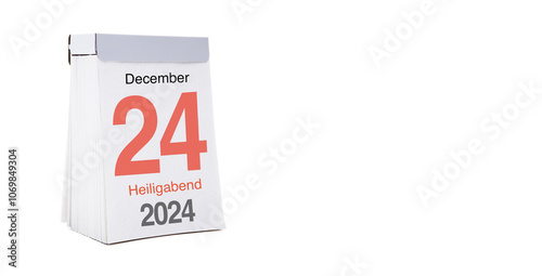 Kalenderblatt Heiligabend vor weissem Hintergrund