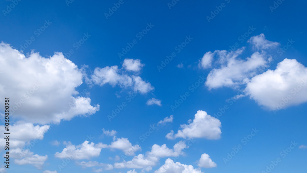 clear blue sky background,clouds with background, Blue sky background with tiny clouds. White fluffy clouds in the blue sky. clear blue sky background,clouds with background, Blue sky background with tiny clouds. White fluffy clouds in the blue sky.