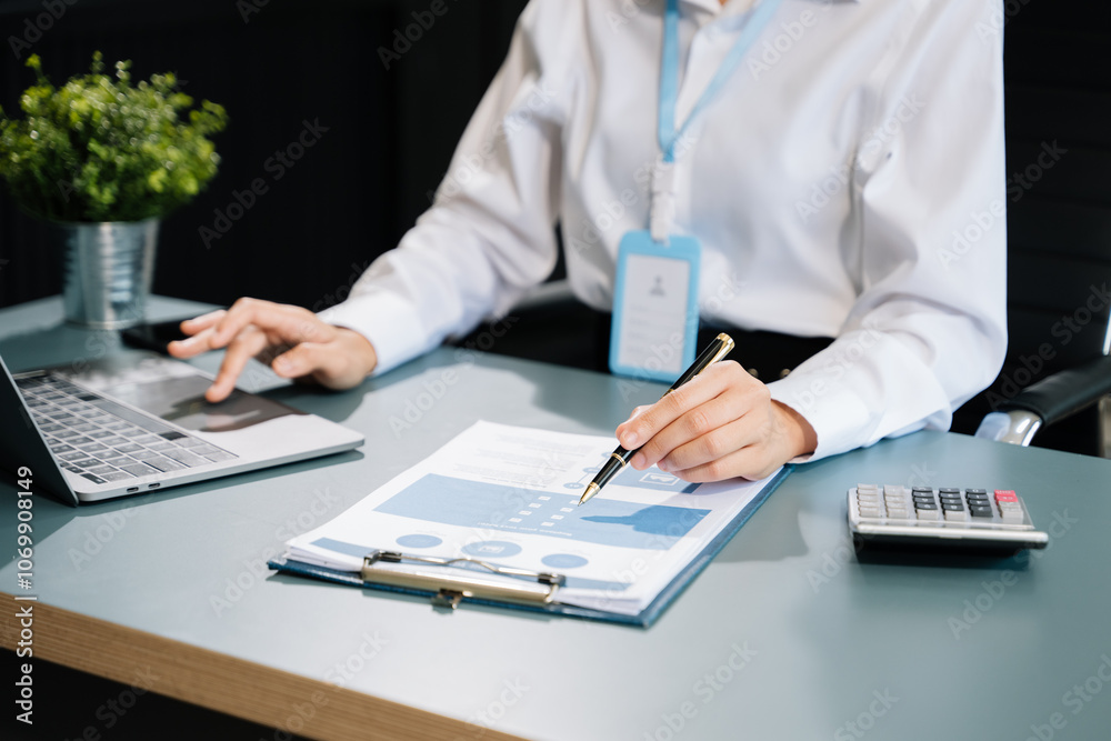 Fototapeta premium Business accountant or financial expert analyze business report graph and finance chart.