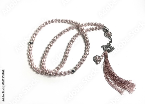 prayer beads for dhikr on an isolated white background photo