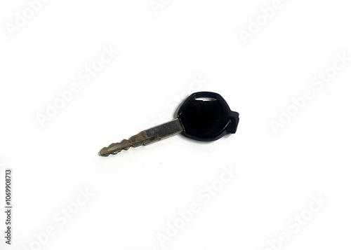 Black motorbike key with isolated background