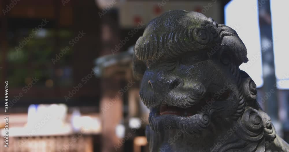 A statue of guardian dog KOMAINU at Nanasha shrine in Tokyo handheld shot A statue of guardian dog KOMAINU at Nanasha shrine in Tokyo handheld shot
