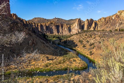 Beautiful rock formations on the riverbanks of Crooked River in the Smith Rock State Park in central Oregon photo