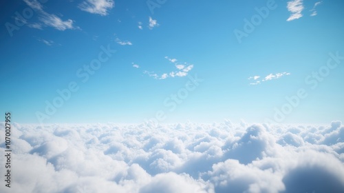 A breathtaking view of fluffy clouds against a vibrant blue sky, creating a serene and peaceful atmosphere.