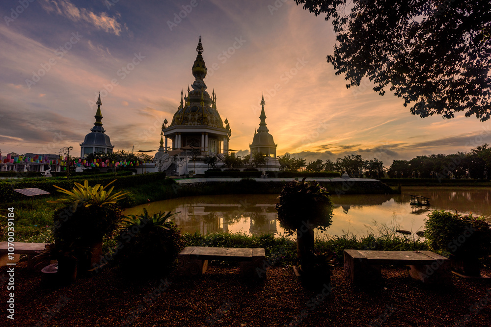 Fototapeta premium The background of an important tourist attraction in Khon Kaen Province (Wat Thung Setthi) is a large pagoda in the middle of a swamp, tourists always come to see the beauty in Thailand