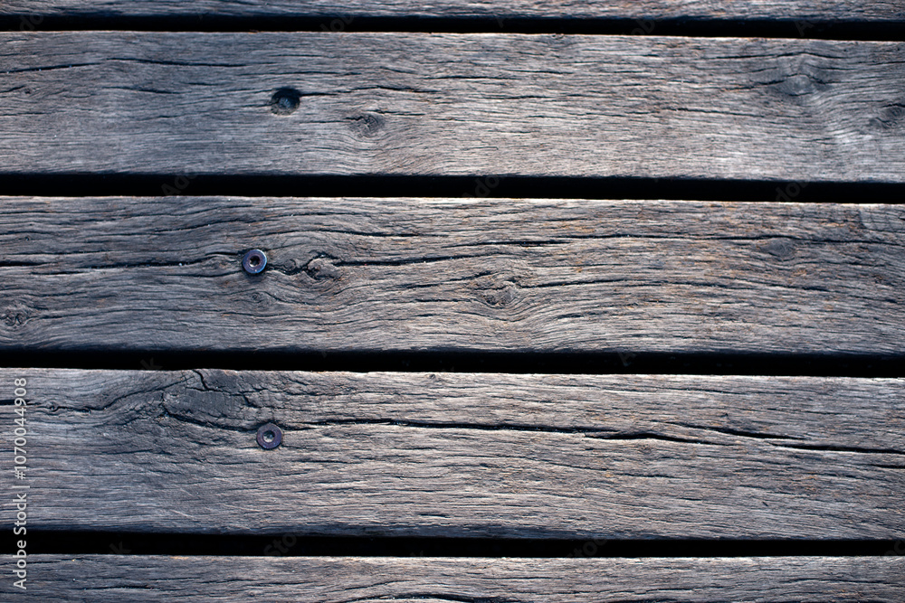 Fototapeta premium an old wooden wall with nails 