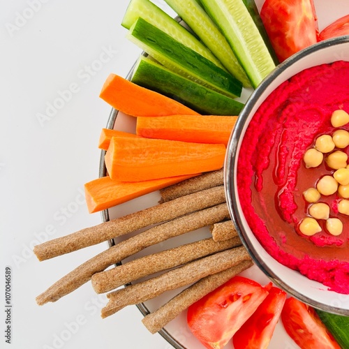 Wallpaper Mural Beet Hummus Dip with Chickpeas on Top and Vegetables on Plate Torontodigital.ca