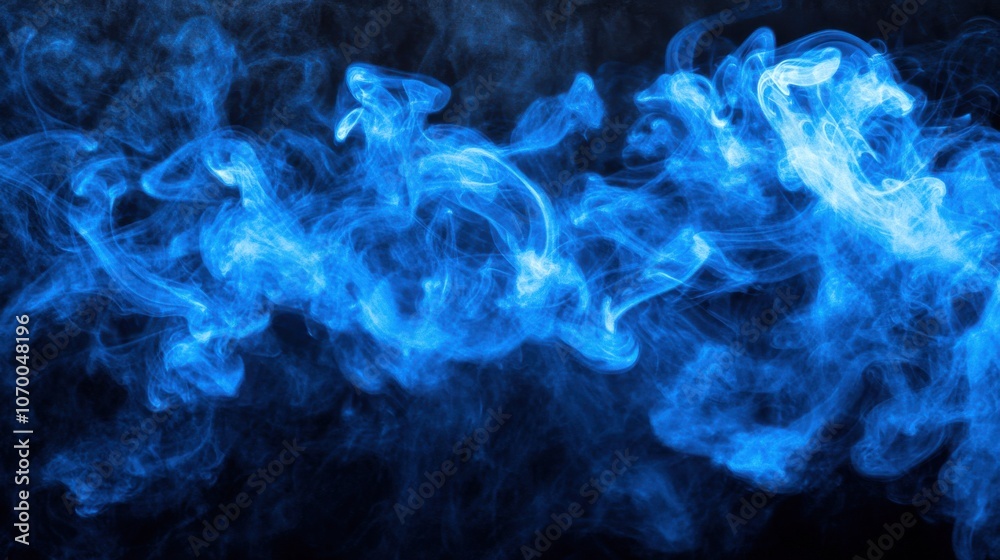 Dynamic blue smoke swirls gracefully against a dark background, creating an ethereal atmosphere. Dynamic blue smoke swirls gracefully against a dark background, creating an ethereal atmosphere.