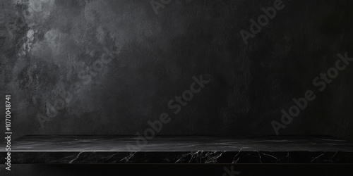 Clean black marble countertop with a smooth, empty surface, framed by a dark black wall background for a sophisticated product display
