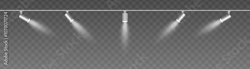 Row of adjustable spotlights with warm white glow, casting angled beams. Modern lighting setup suitable for stage, exhibition, or interior decor, adding ambiance against a dark background