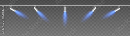Row of adjustable spotlights with warm blue glow, casting angled beams. Modern lighting setup suitable for stage, exhibition, or interior decor, adding ambiance against a dark background
