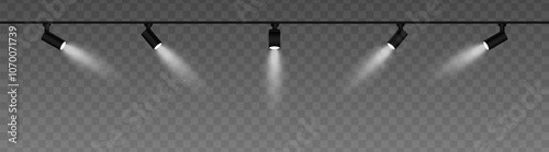 Row of adjustable spotlights with warm white glow, casting angled beams. Modern lighting setup suitable for stage, exhibition, or interior decor, adding ambiance against a dark background