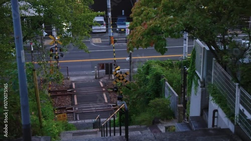 Railway Crossing and Road in Small Town, Onomichi, Japan photo