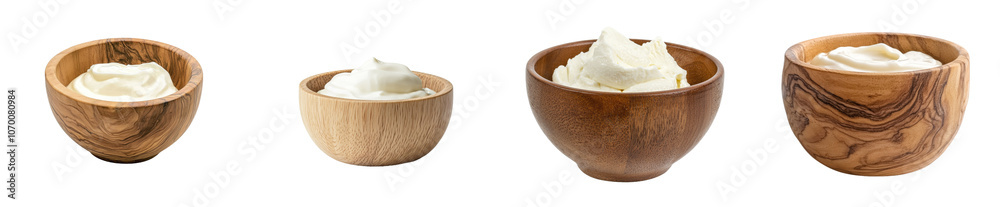 Stack of wooden bowls with sour cream isolated on transparent backgrounds