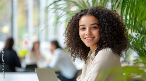 The Smiling Woman with Laptop photo