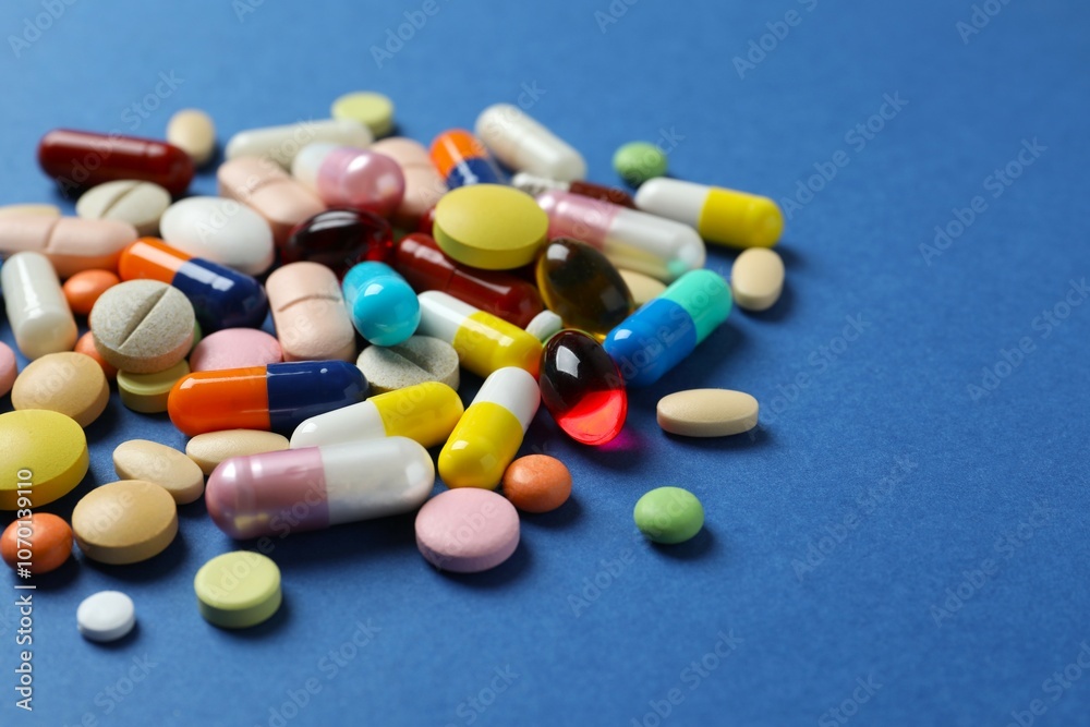 Various medicine pills on color background Various medicine pills on color background