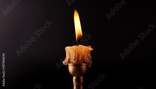 Candle light fire black background illuminated.