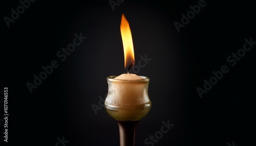 Candle light fire black background illuminated.